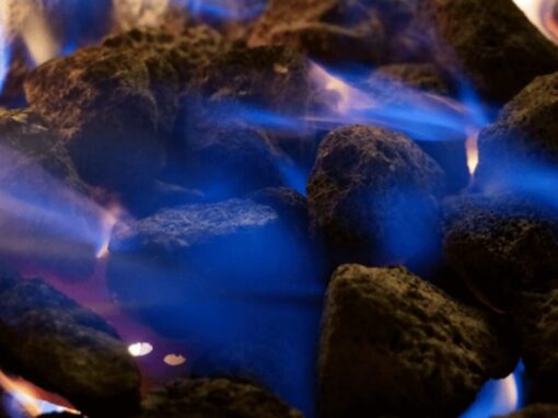 coal on fire with blue flames