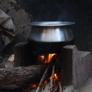 cooking pot on a wooden fire
