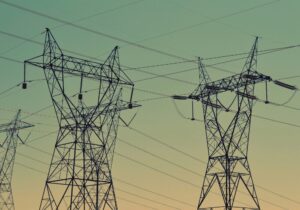 electricity powerlines against a blue sky