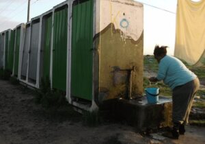 A communal tap in an informal settlement in Cape Town
