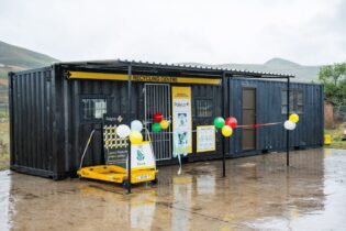 PolyCo recycling centre container in the rain