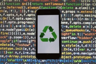 Recycling symbol on a phone app against coding language