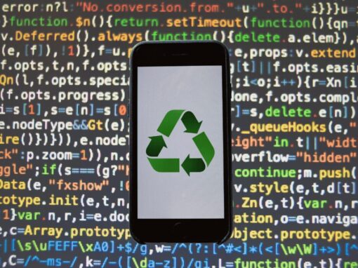 Recycling symbol on a phone app against coding language