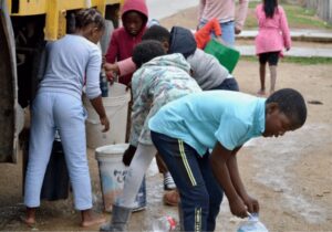 Residents fetch water from a truck in KwaNobuhle, in the Eastern Cape
