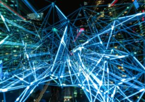 digital data between buildings in bright blue colours