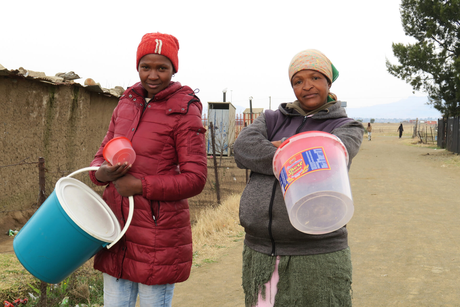 Evelyn Ramodike and Boitumelo Molefe from Extension 26 informal settlement in Thaba Nchu on a search for water.
