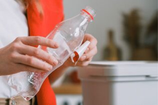 recycling plastic bottle by removing the label