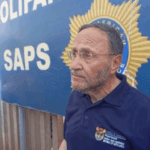 Dr Bloom outside Oliefantsfontein police station