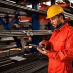 Himel engineer near steel pipes