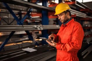 Himel engineer near steel pipes