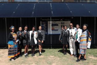 Learners and educators at Ebenezer Majombozi High School at the handover of a new 15kW portable Solar PV container from Engen