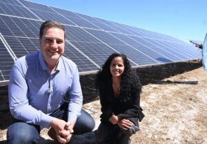 Mayor Hill-Lewis and Alderman Limberg infront of a solar panel