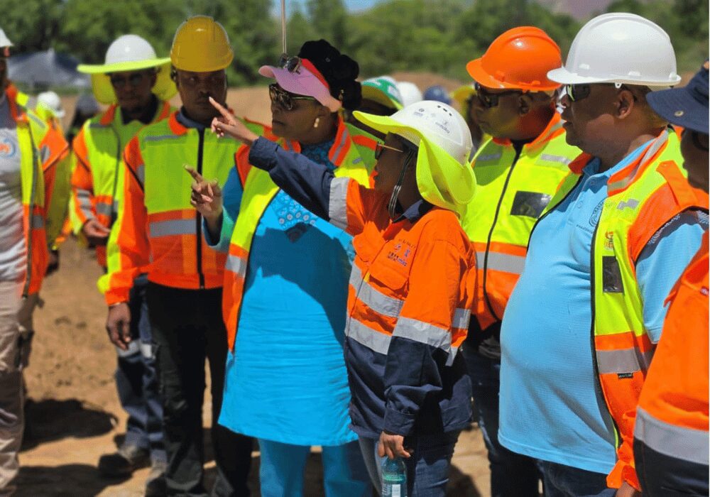 Water and Sanitation Minister Pemmy Majodina outdoors for the Mokolo-Crocodile Water Augmentation Project