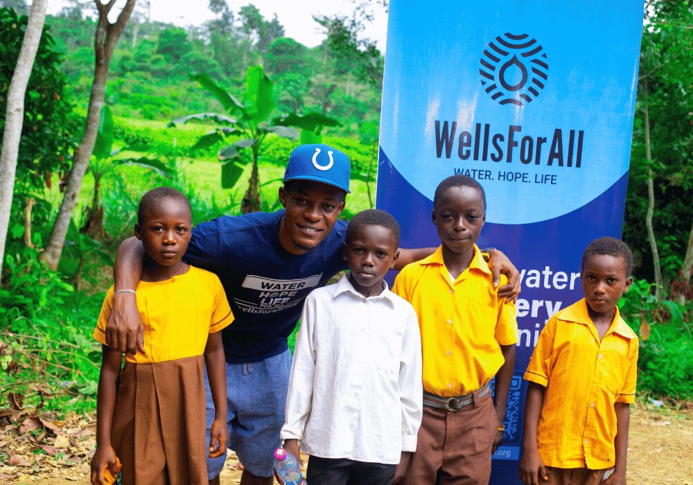 WellsForAll water tower photo with children at the launch