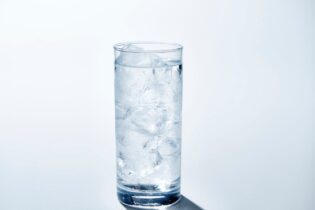 clear glass of iced water