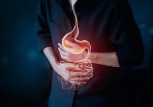 gastrointestinal illness focused on a stomach of a man