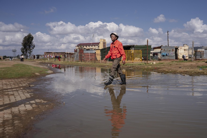 sewage-flooded street in the RDP section of extension 7 of Delareyville.