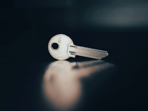rental housing key isolated on a black background